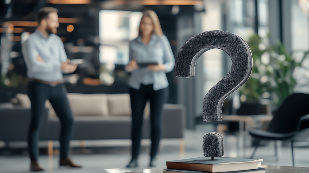 Modern office discussion with a focus on a question mark symbol, symbolizing doubt, inquiry, or decision-making. Choosing cloud or traditional print.